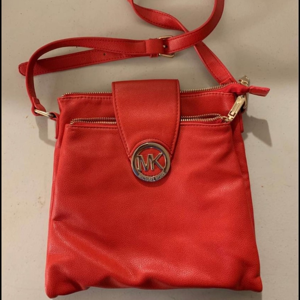 Micheal Kor red crossbody bag